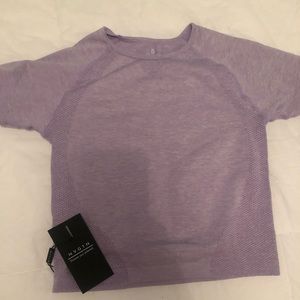 NVGTN spandex tee SMALL. Brand new. Never worn